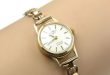 Ladies 9ct gold Rotary watch set with Rolled Gold strap. Ref .