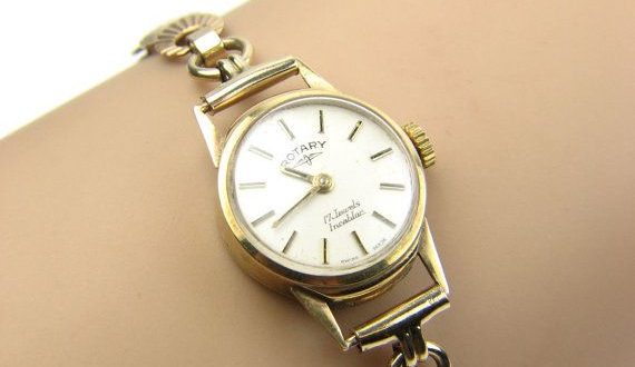 Ladies 9ct gold Rotary watch set with Rolled Gold strap. Ref .