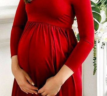 This maternity dress is absolutely stunning! And that deep red .