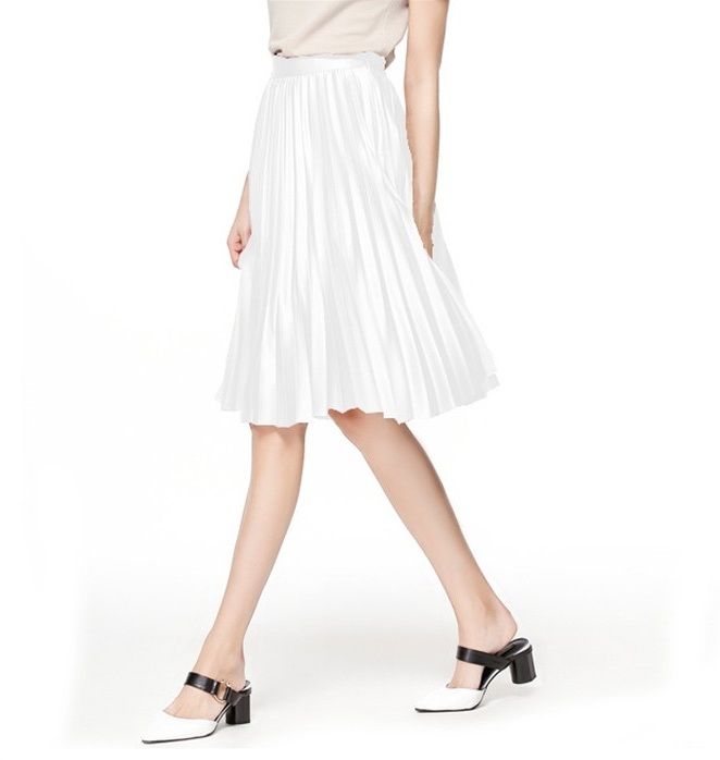 CLICK on the photo to shop this beautiful white pleated skirt .
